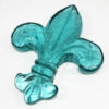 Aqua glass Fleur De Lis Paperweight.