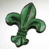 Green glass Fleur De Lis Paperweight.