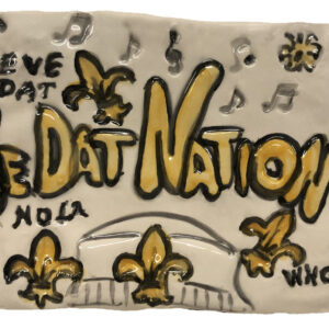 WE Dat Nation Ceramic Plaque with Fleur De Lis and music notes.