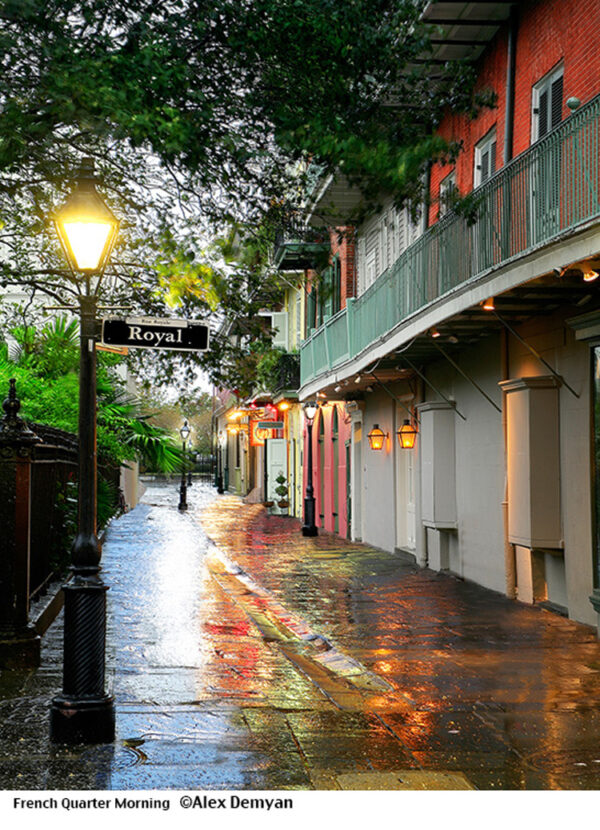 French Quarter in New Orleans with wet reflective sidewalks.