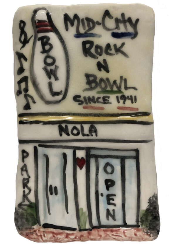 Ceramic plaque of Mid-City Rock N' Roll Bowling in New Orleans.