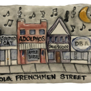 Plaque depicting clubs on Frenchmen Street in New Orleans.
