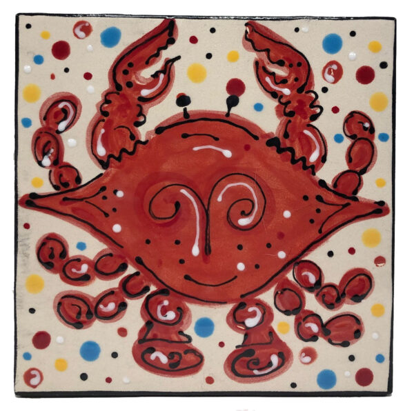 Red Crab painted on a ceramic tile.