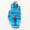 aqua sculpted glass hand.