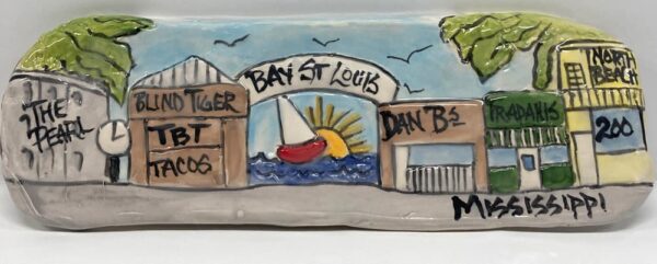 Clay Creations plaque of Bay St. Louis landmarks.