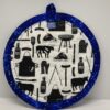 New Orleans' water meter inspired Potholders named for NOLA neighborhoods by Tracy Thomson of Kabuki Designs.